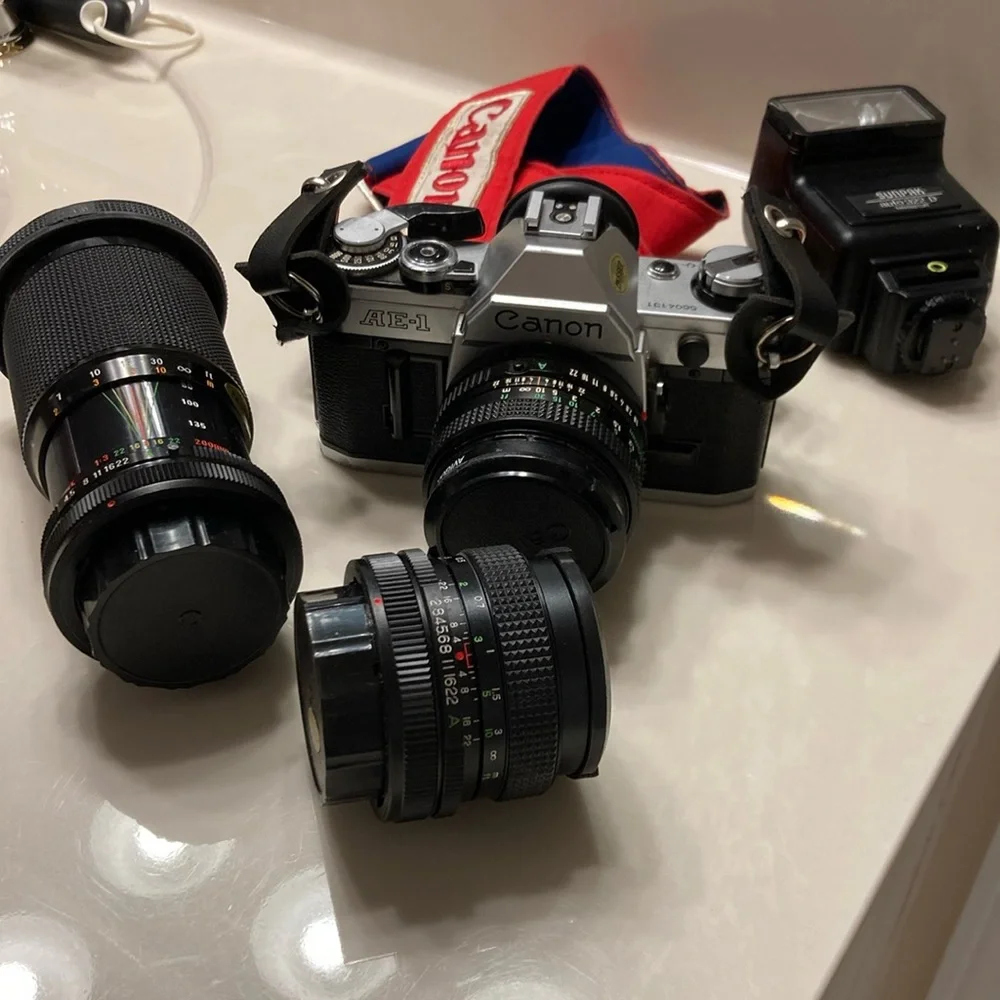 Vintage Canon Camera with additional lenses.
